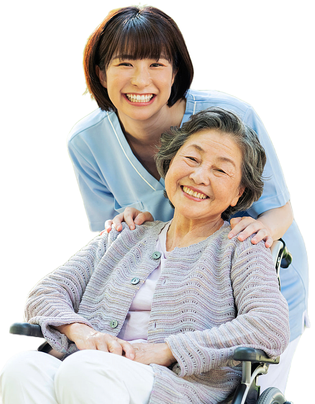 female caregiver with an elderly woman smiling