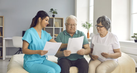 caregiver talking to her patients